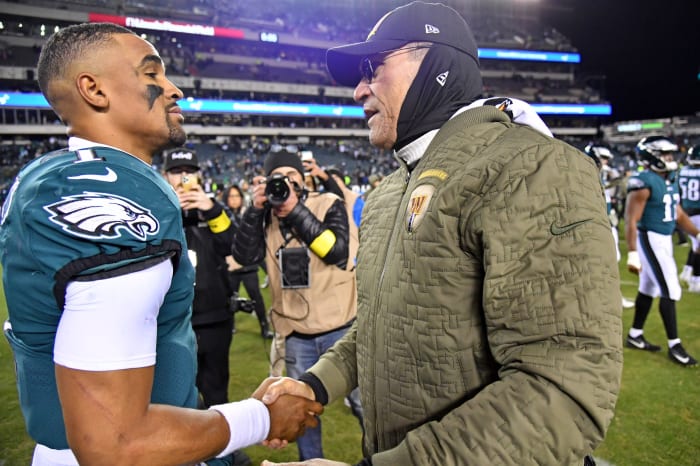 Jalen Hurts and Washington coach Ron Rivera after Commanders win in Week 10 of the 2022 season
